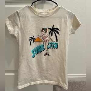 Suavacita tee, size medium.